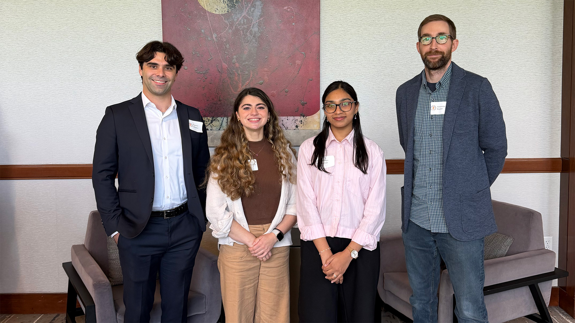 Group photo of Connor, Cristina, Nimra, Alex