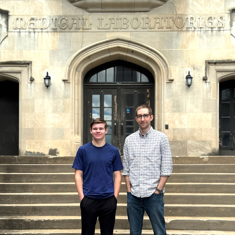 Alex and Miles standing in front of Med Labs